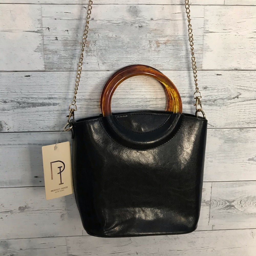 Black top handle bag with removable chain …